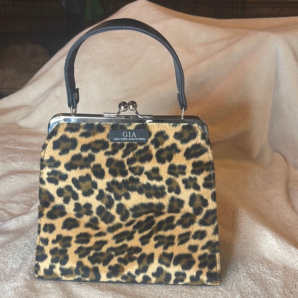 GIA New York, London, Paris faux fur bag